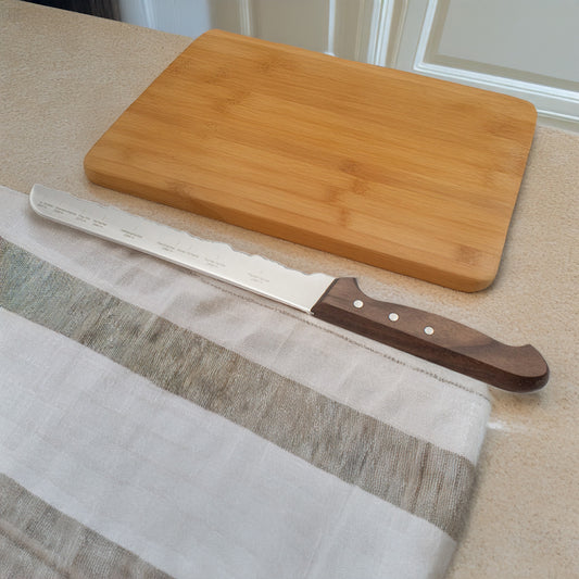 Brotmesser Nordkette | mit Panoramaschliff | handgemacht | aus Rockwell-Stahl mit Nussholzgriff | Made in Schwitzerland